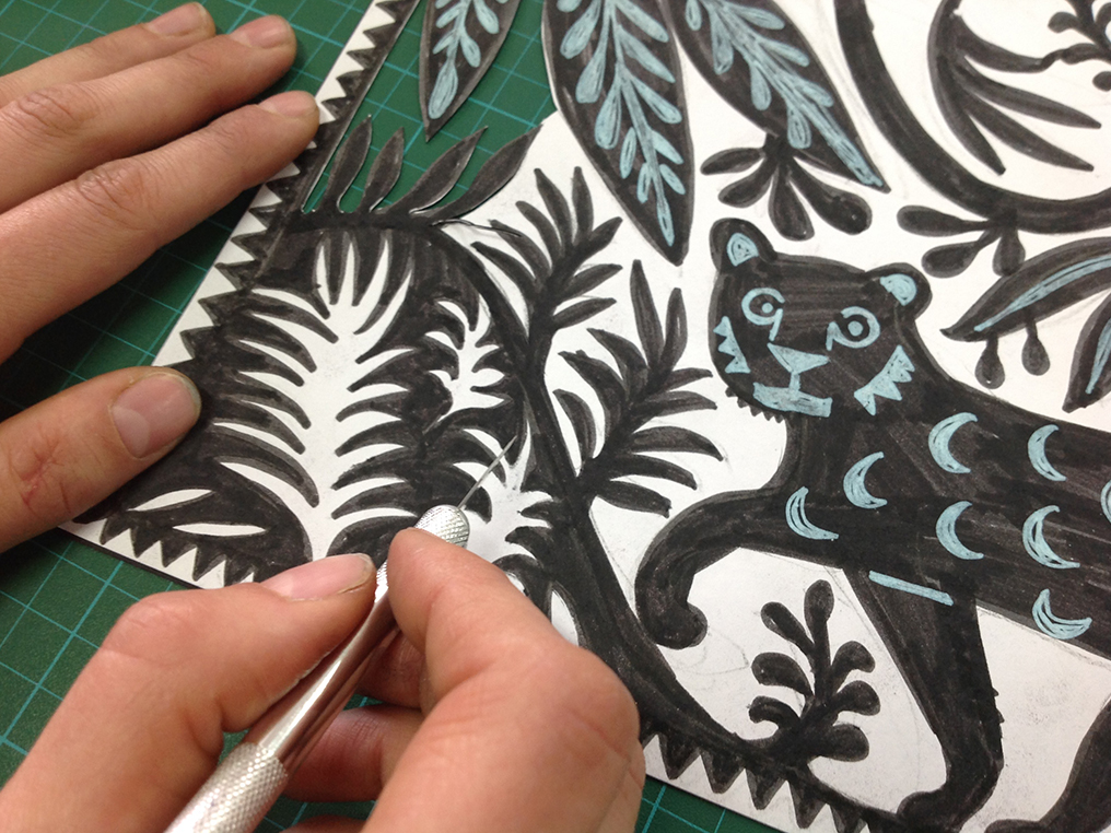 Making a paper cut-out artwork, “In the great forest”